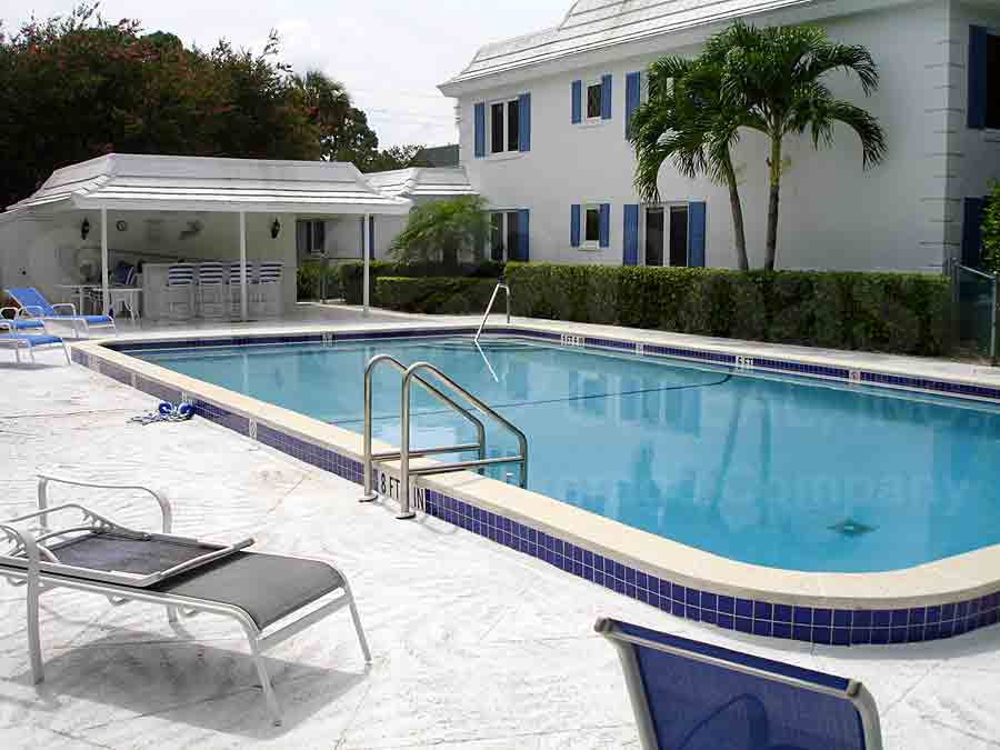 Palm Royal Community Pool and Sun Deck Furnishings